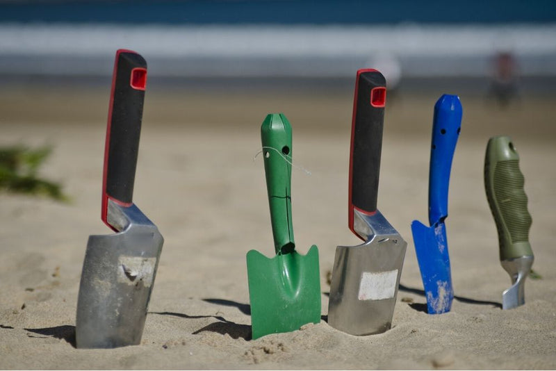 shovels in the sand
